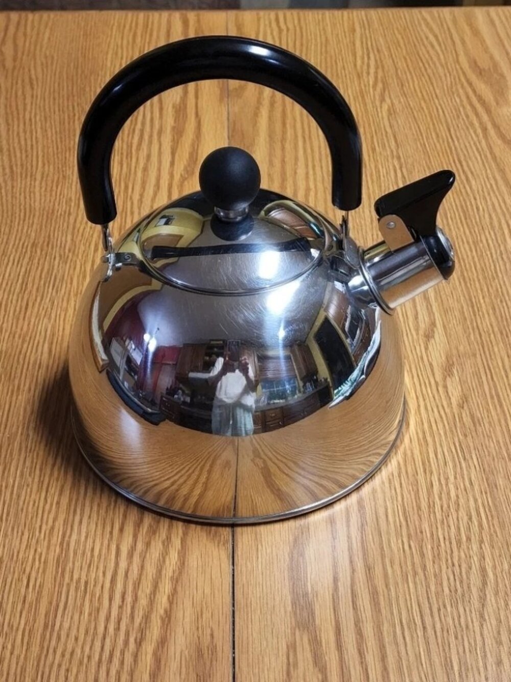 Copco Whistling Stainless Tea Kettle With Black Folding Handle